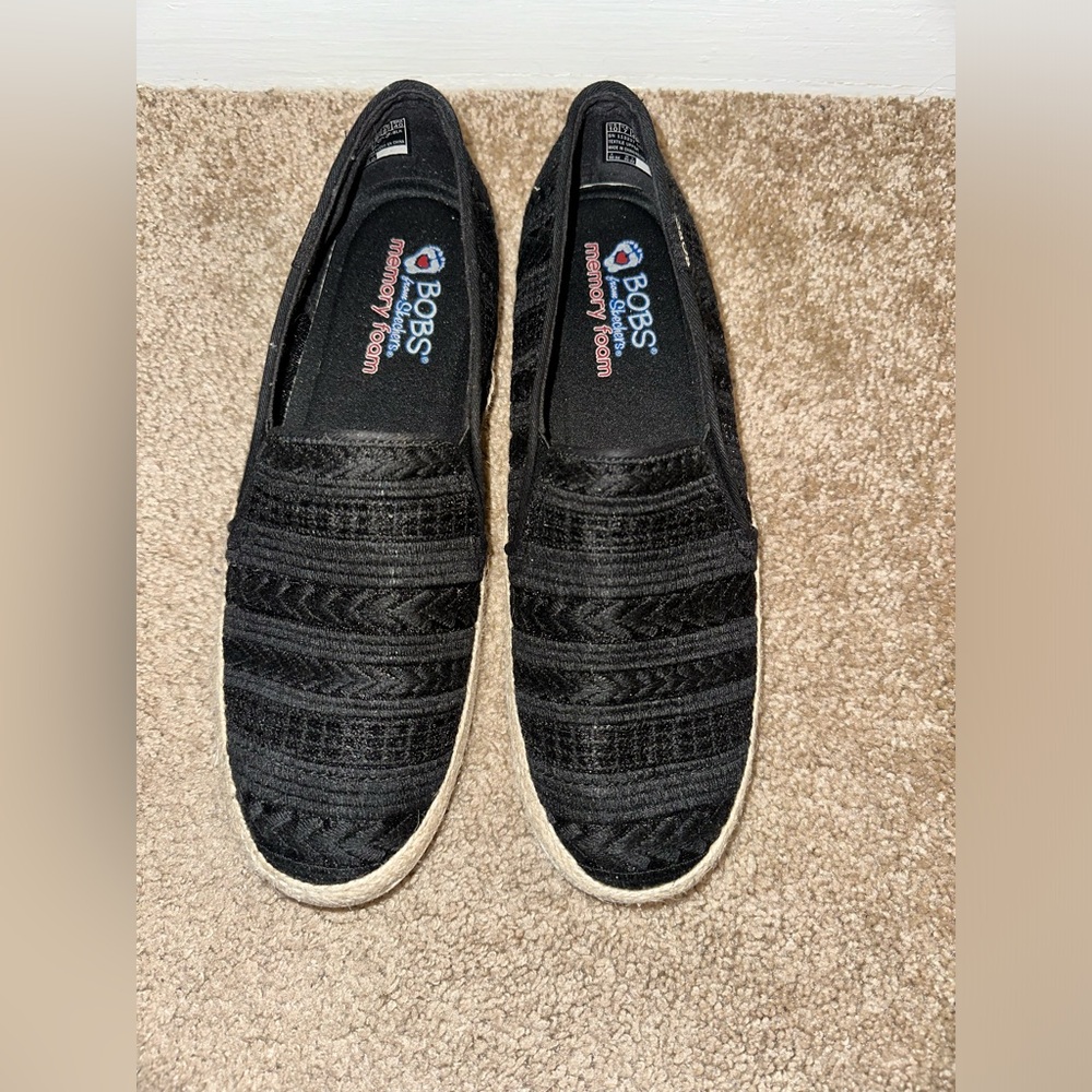 Black slip on women’s sneaker. Size 10.